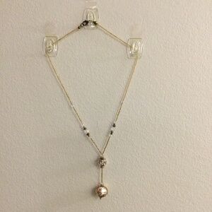 2/$15 Item 18 Necklace 18 in beaded chain with gold beads and pendant